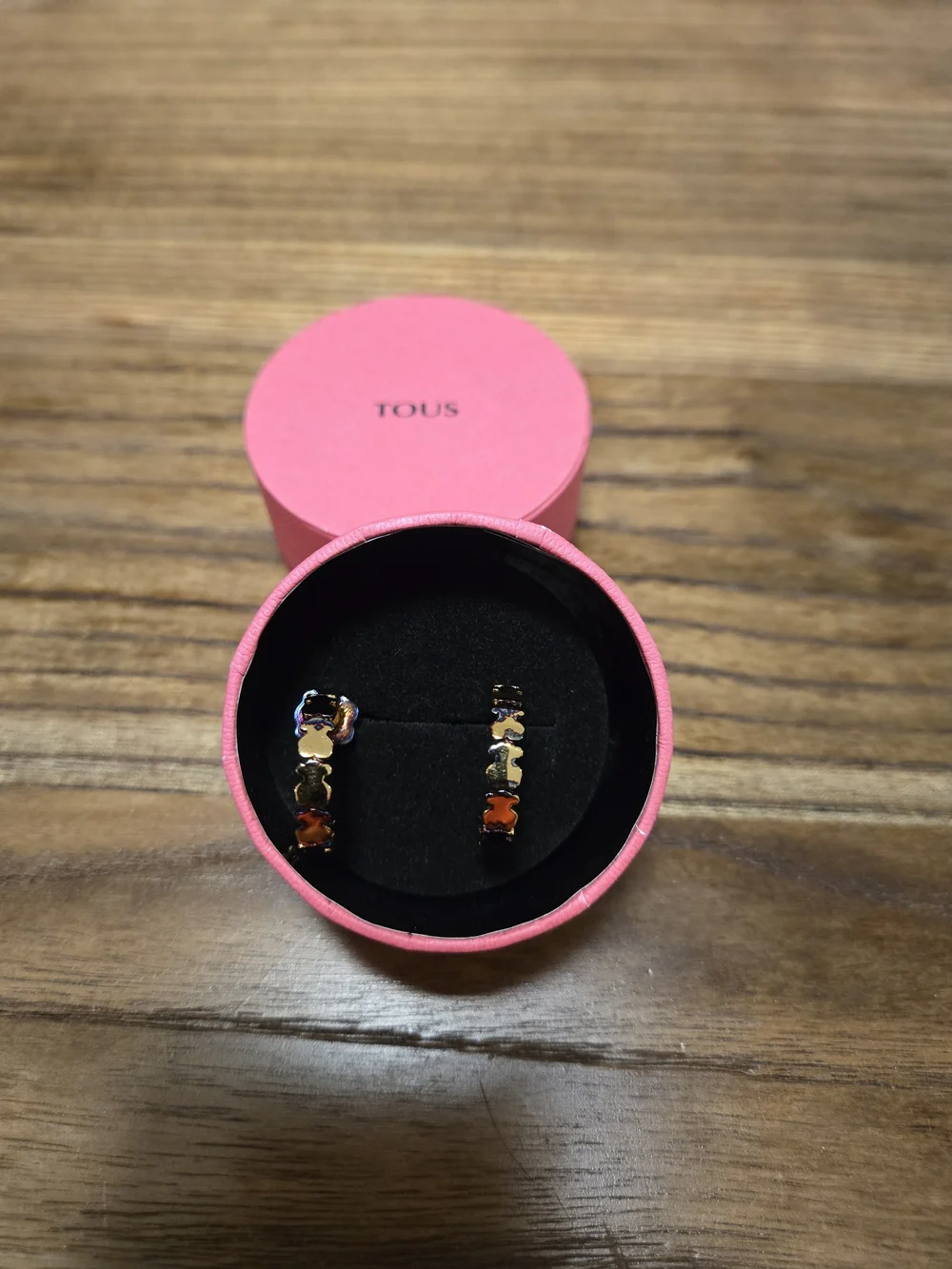 Tous gold tone